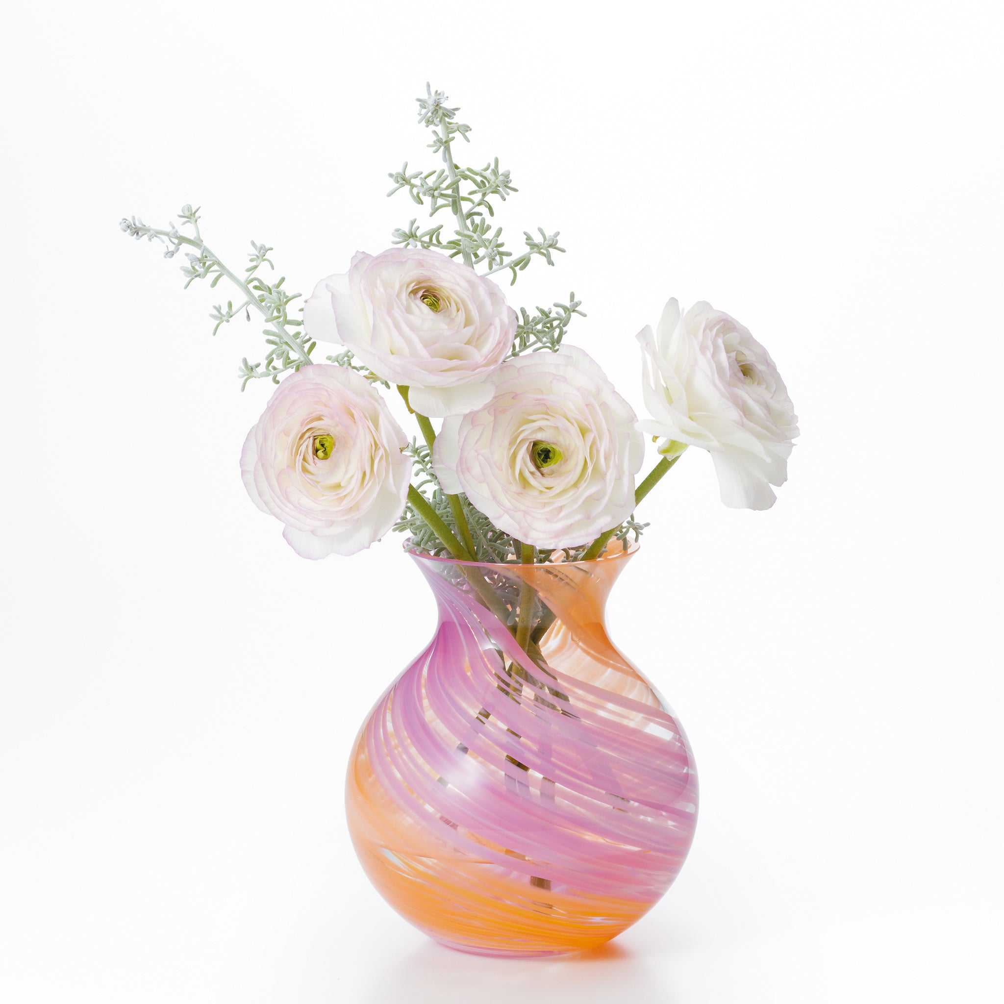 津軽びいどろ 花しずく ブーケポットピンク 数本の切り花が活けられた花器の画像